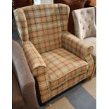 A Modern Upholstered Wing Armchair