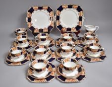 An Edwardian Imari Pattern Tea Set by Royal Vale to comprise Ten Cups, Saucers and Side Plates,