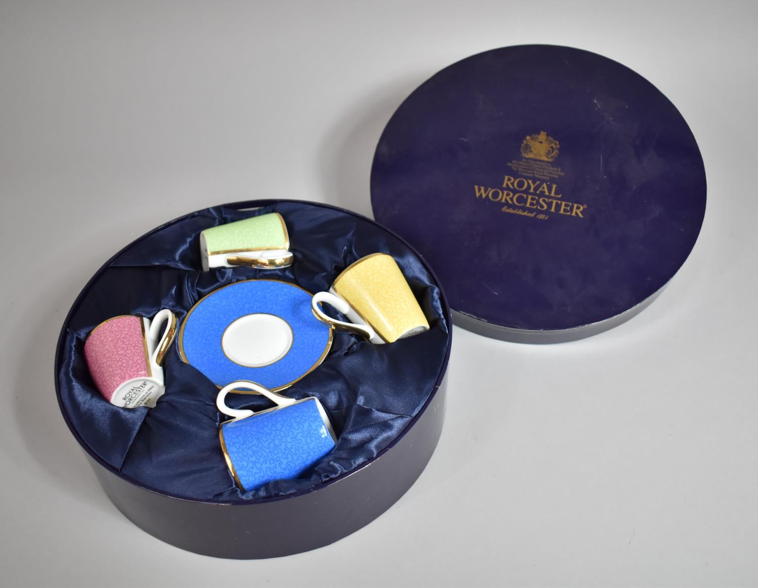 A Boxed Royal Worcester Coffee Set for Four to Celebrate Queen's 80th Birthday