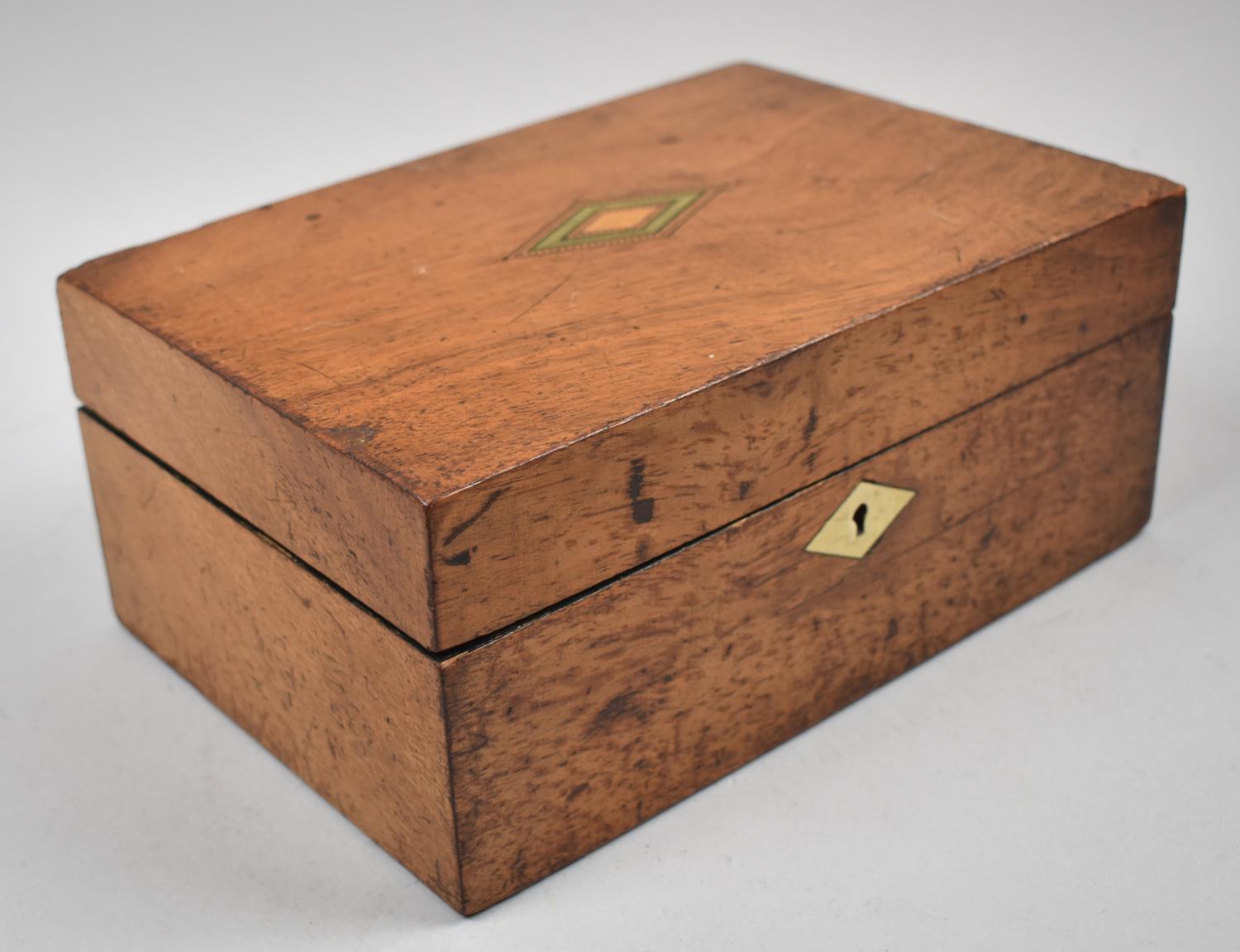 A Late Victorian/Edwardian Inlaid Walnut Workbox with Fitted Removable Tray Containing Various