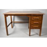 A Mid 20th Century Oak Flat Top Desk with Three Side Drawers and Pull Out Slide, 121cm Wide
