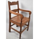 A Pitch Pine Ladder Back Armchair