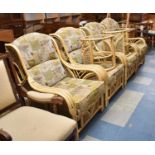 A Bamboo Conservatory Suite Comprising Four Scroll Armchairs and Two Circular Coffee Table