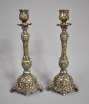 A Pair of Silver Plated Candlesticks on Scrolled Supports, 30cm high