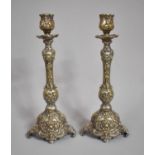 A Pair of Silver Plated Candlesticks on Scrolled Supports, 30cm high