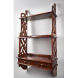 A Reproduction Mahogany Wall Hanging Three Tier Whatnot Shelf with Two Base Drawers, 49cm Wide