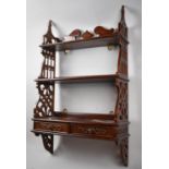 A Reproduction Mahogany Wall Hanging Three Tier Whatnot Shelf with Two Base Drawers, 52cm wide