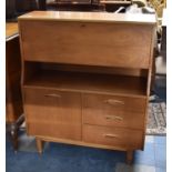 A Mid 20th Century Teak Side Unit with Pull Down Front To Fitted Interior, Central Open Area and