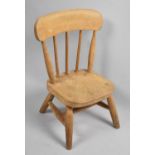 A Child's/Dolls Spindle Back Chair