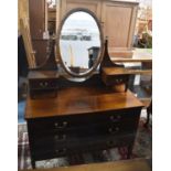 An Edwardian Mahogany Dressing Chest, the Base with Two Short and Two Long Drawers, Raised Jewel