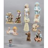 A Collection of Continental Bisque and Other Figural Ornaments