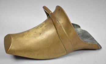 A Single Brass Indo-Persian Stirrup in the Form a Shoe, 26cm Long