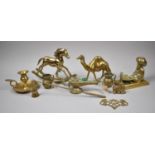A Collection of Brass Ornaments to Include Aladdin Lamp, Rocking Horse, Camel, Bedchamber Stick,