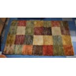 A Modern Square Patterned Woollen Rug, 90x170cm