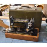 A Cased Electric Sewing Machine