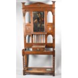 An Arts and Crafts Hall Stand with Central Glove Drawer, Display Shelf and Rectangular Mirror