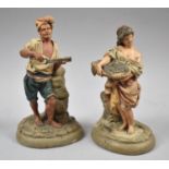 A Pair of Cold Painted German Terracotta Figures of Fisherman Playing Mandolin and Wife of Basket of