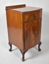An Edwardian Bow Fronted Mahogany Bedside Cabinet with Top Drawer and Shelved Cupboard, Galleried
