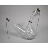 A Cut Glass Wine Decanter with Silver Mounts, Cracked, 27cm high
