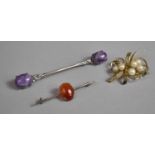 A Collection of Three Silver Brooches Long Silver and Amethyst Brooch having Cabochons to Ends in an