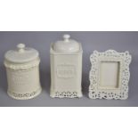 A Creamware Flour Bin, Easel Back Photo Frame and a Cylindrical Cookie Jar