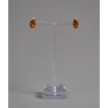 A Pair of Gilt Silver and Amber Teardrop Shaped Earrings. 1.4cms Long