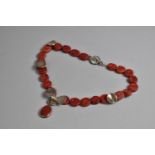 A Heavy Silver and Dyed Red Sponge Coral Necklace, Handmade having Silver Discs and Coral Slices,