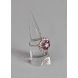 A Good 18ct Gold Diamond and Ruby Floral Cluster Ring, Centre Brilliant Cut Diamond (Approx .3ct)
