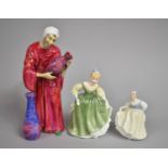 A Ricard Studio Pot Seller Figure, Royal Doulton Fair Maiden and Fair Lady Figures