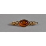 A Gilt Silver and Amber Celtic Style Brooch 4.2cms Long