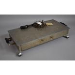 A Silver Plated Rectangular Warming plate with Ebonized Wooden Handles and Set on Four Feet, 50cms