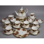 A Royal Albert Tea Set To Comprise Tea Pot, Six Cups Saucers, Milk Jug, Seven Small Bowls, Sugar