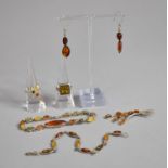 A Collection of Silver and Amber Jewellery to include Brooch, Earrings Bracelets and Rings