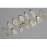 A Collection of Various Mother of Pearl Pendants in the Form of Buddha, Deities, Crucifix Etc