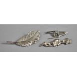 A Collection of Three Various Silver Brooches to include 'Ecco' Feather, Rose and Vines Etc