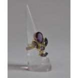 A Pretty Eastern Silver and Amethyst Multi-Jewelled Ladies Dress Ring, Shank also Embossed with
