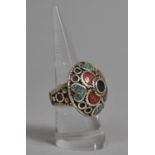 An Eastern Silver Dress Ring with Coral and Turquoise Inlay
