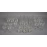 A Collection of Various Cut Glass Drinking Glasses to comprise Highball, Tumblers, Wines, Champagnes