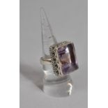 A Large and Heavy Silver and Amethyst Eastern Dress Ring, Faceted Stone 2cms x1.7cms