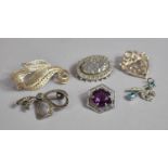 Four Silver Brooches to include Two Marcasite Examples, Filigree Example and an Amethyst Glass Stone
