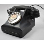 A Vintage Black Bakelite Telephone