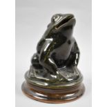 A Modern Glazed Ceramic Novelty Money Box in the Form of a Seated Frog, 15cm high