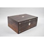 A Late 19th Century Rosewood Ladies Workbox, the Hinged Lid with Mother of Pearl Escutcheon and
