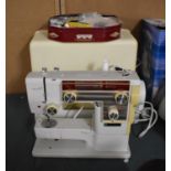 A New Home Model 609 Electric Sewing Machine with Case