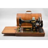A Vintage Oak Cased Singer Manual Sewing Machine