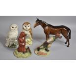 A Beswick Bois Borsu, Two Beswick Whyte and Mackay Owls and Two Resin Figures, Liam and Lady Sarah