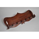 A Victorian Mahogany Six Section Rack, 50cms Wide.