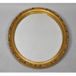 A Mid 20th Century Oval Gilt Framed Wall Mirror, 54x44cm