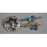 Two Silver Mounted Brooches, One with Opel the Other with Pale Blue Stones Together with a Siam