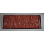 A Carved African Panel Depicting Family Scenes, 76cm x 29cm